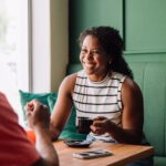 Coffee,Meet,Up,-,A,Cheerful,Black,Woman,Enjoys,A