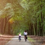 Little,Girl,Cycling,With,Her,Mother,In,Holland