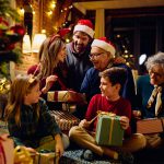 Happy,Multigeneration,Family,Enjoying,In,Opening,Gifts,On,Christmas,Eve