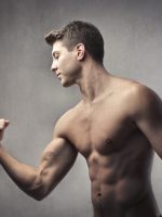 Handsome,Man,Showing,His,Biceps