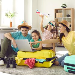 Happy,Excited,Family,And,Daughter,Children,Buying,Payment,For,Flight