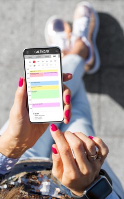Woman,Using,Calendar,App,On,Her,Phone
